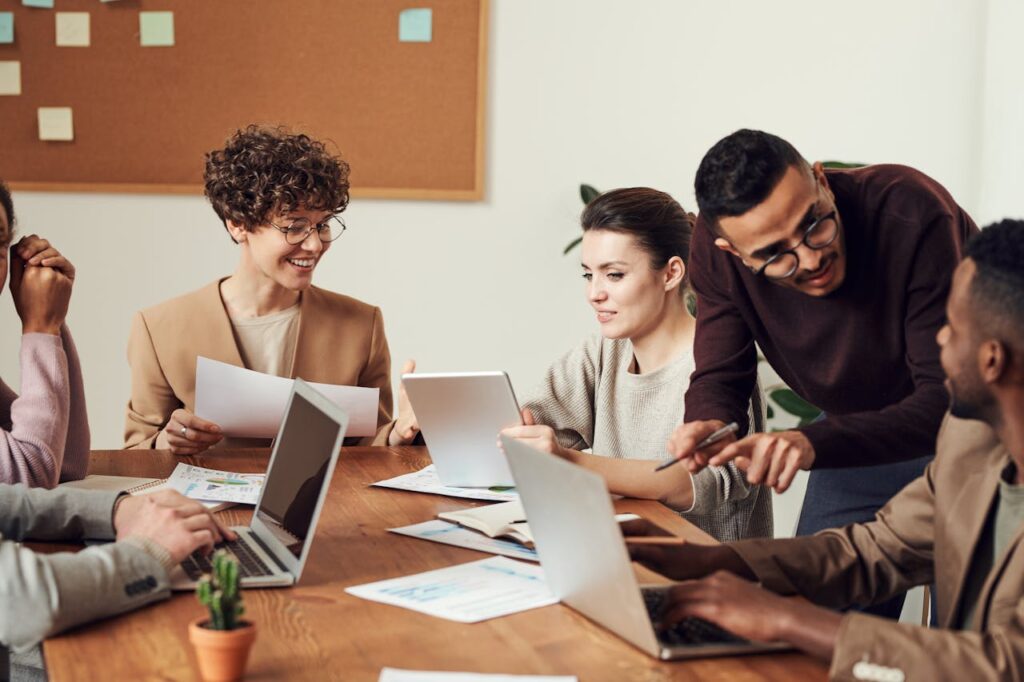 uk startup founder working with his employees